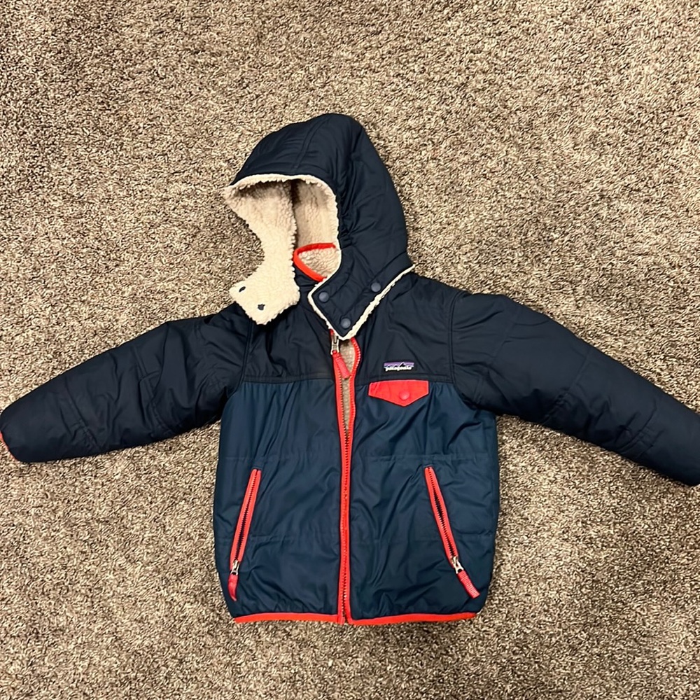 Patagonia winter coat, reversible, navy blue, and red with hood